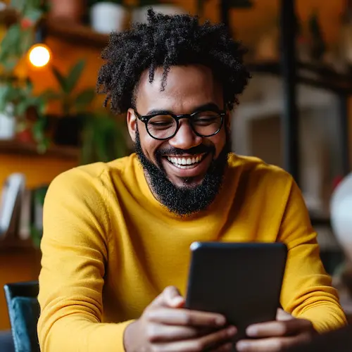 A client reviews a digital project on their laptop, highlighting the web design services of a digital marketing agency, covering SEO optimization, responsive web design, and e-commerce solutions.